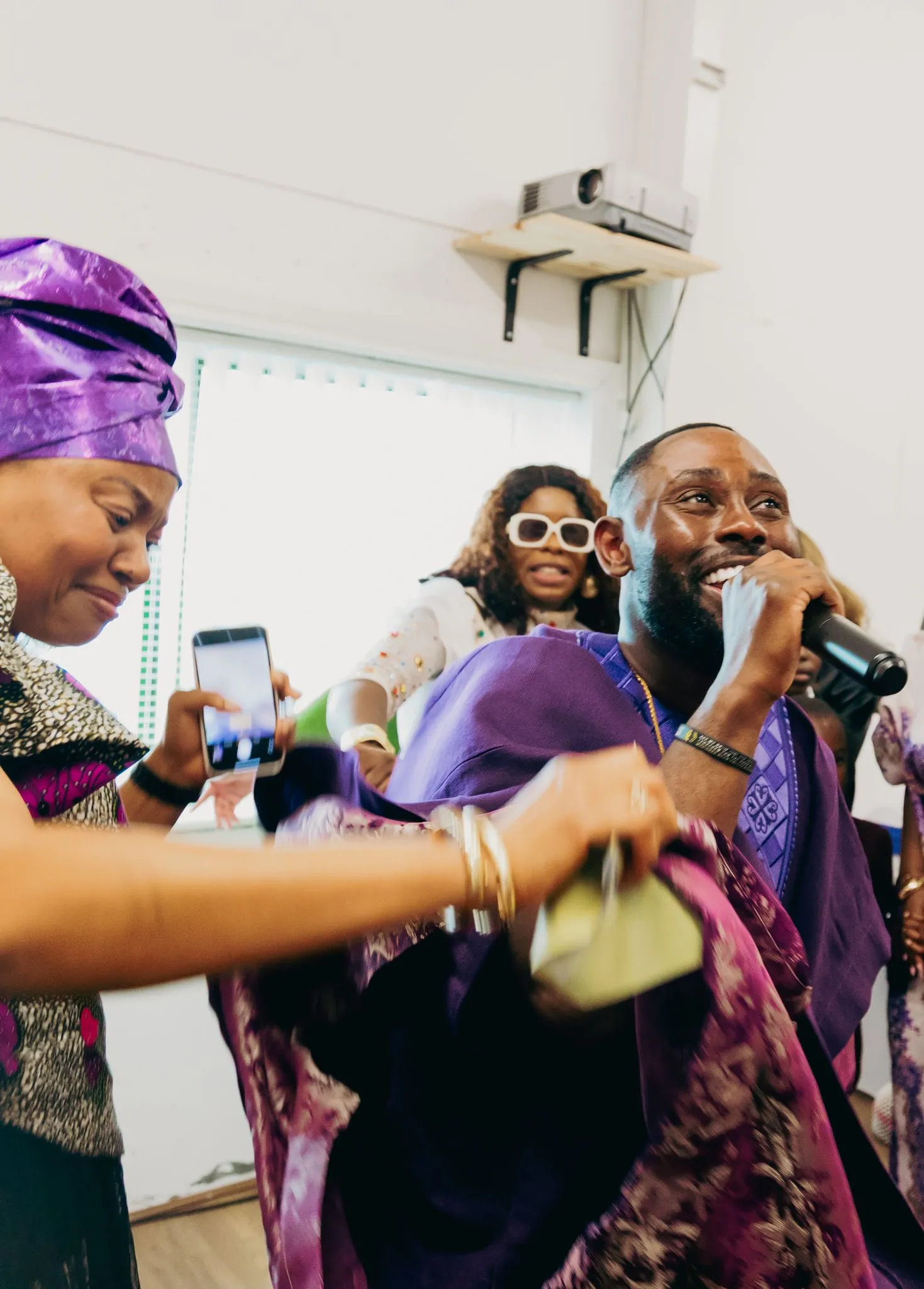 Joyful African cultural celebration with singing and dancing.