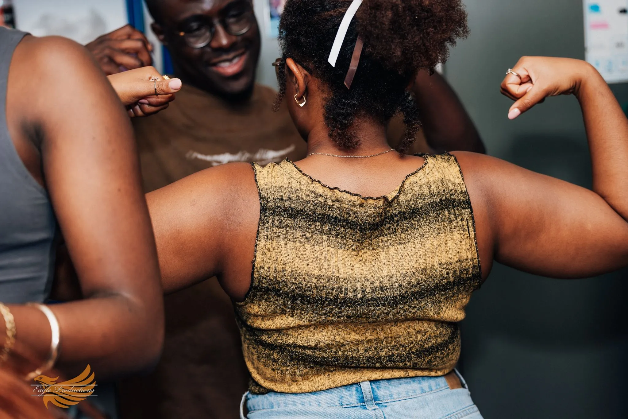 People dancing energetically at a celebration party.