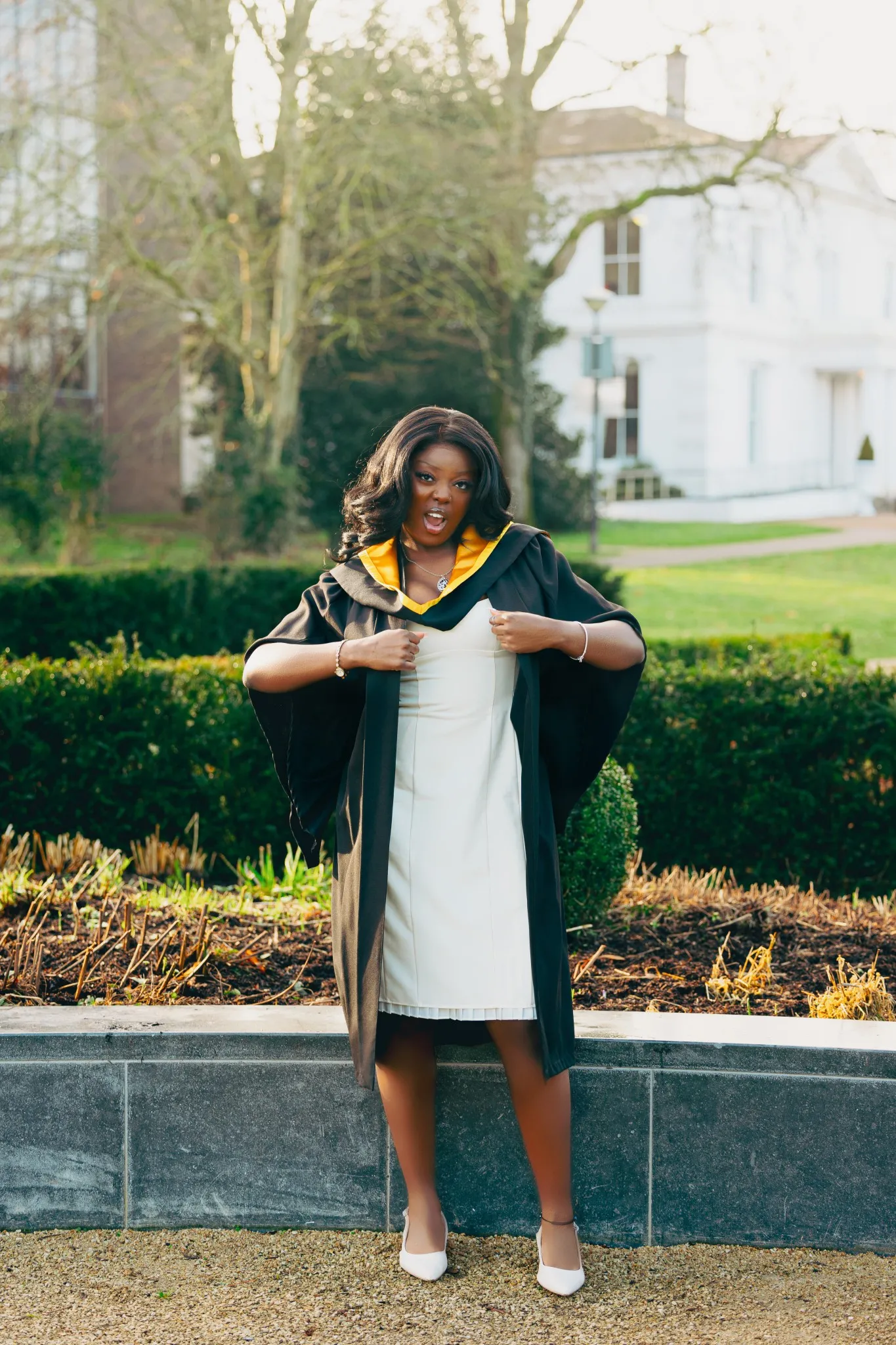 Eagle Productions Graduation Woman Gown Campus Gardens