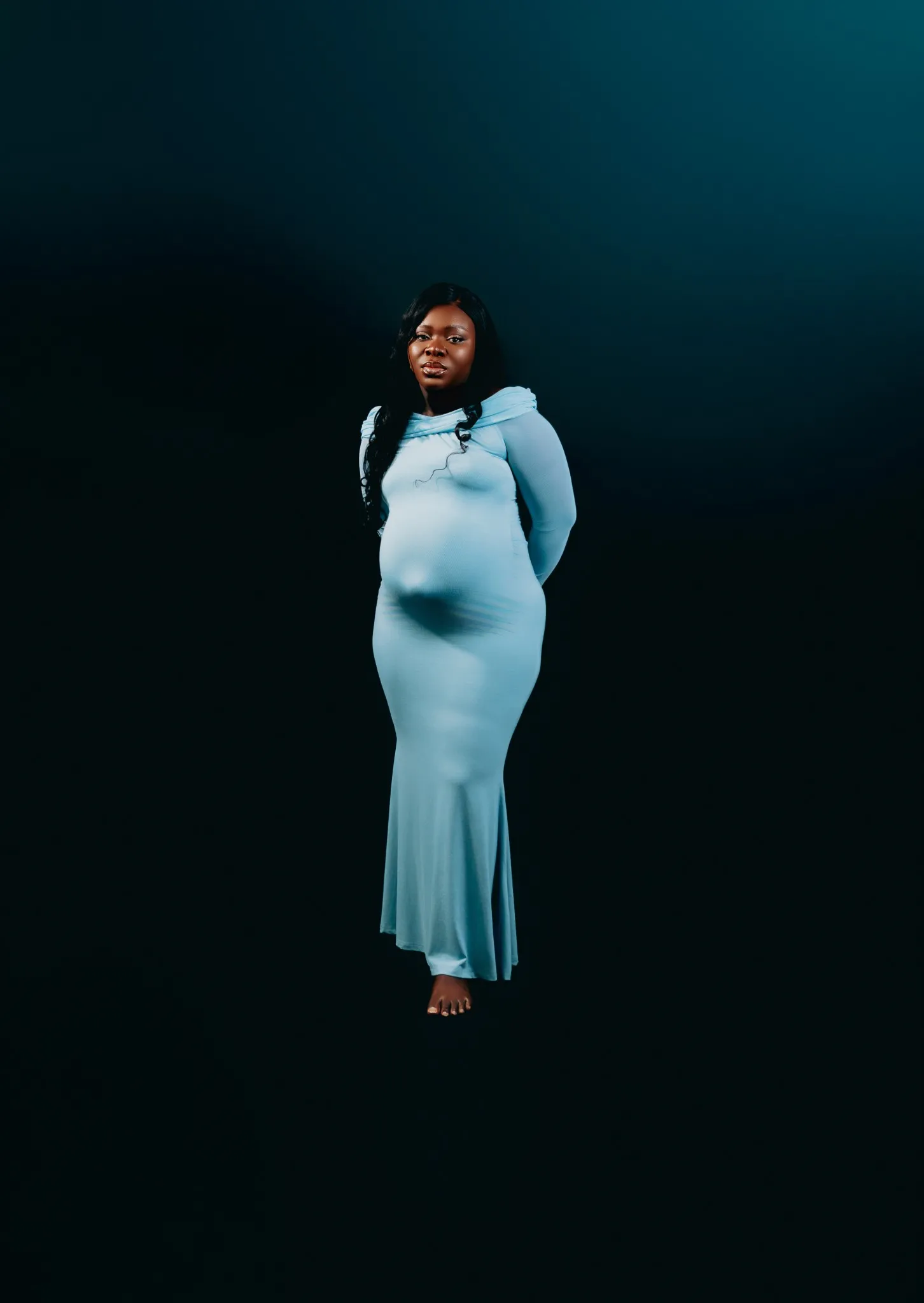 Eagle Productions Maternity Woman Blue Dress Dark Background