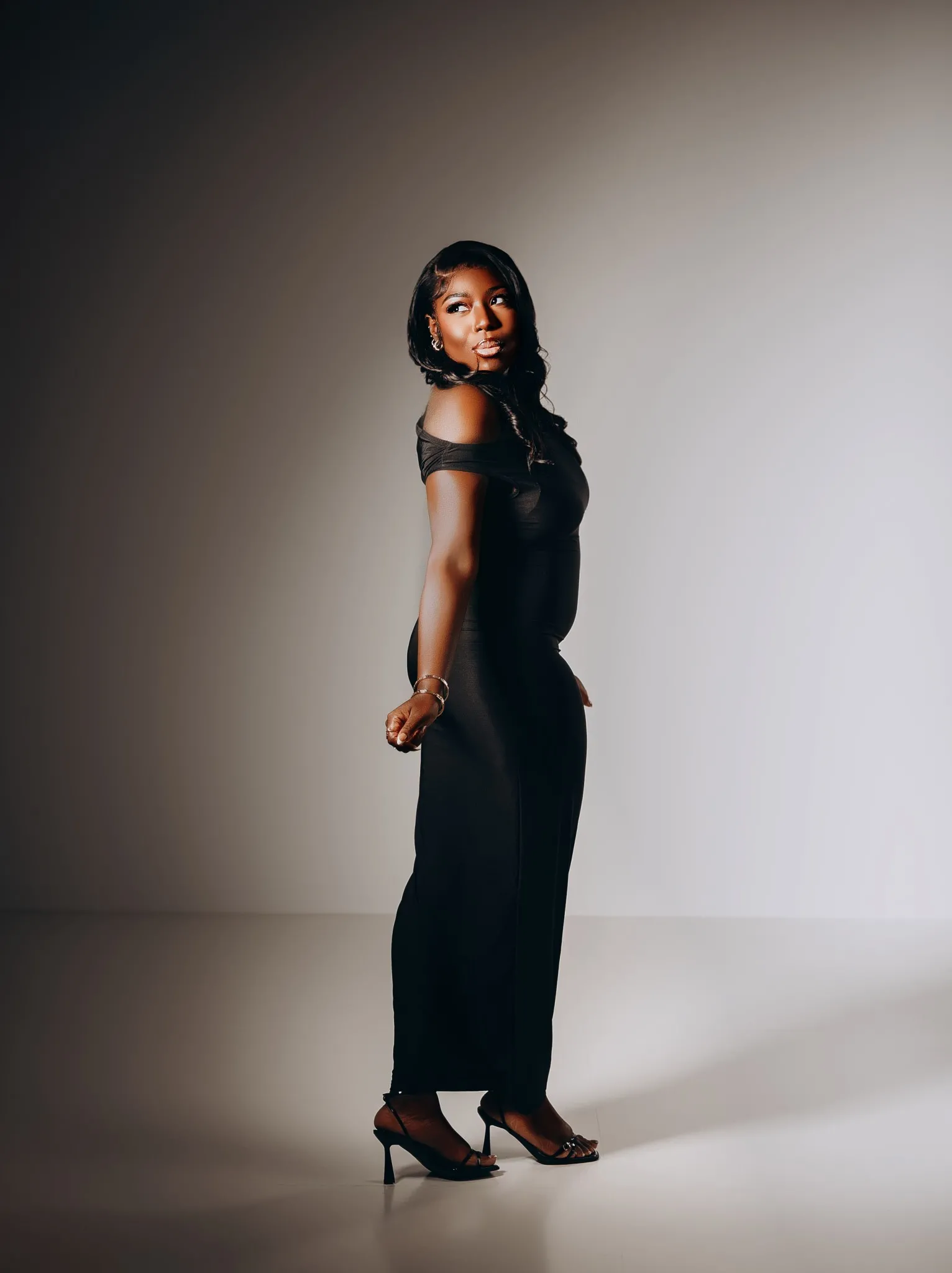 Eagle Productions Portraits Woman Black Jumpsuit White Background