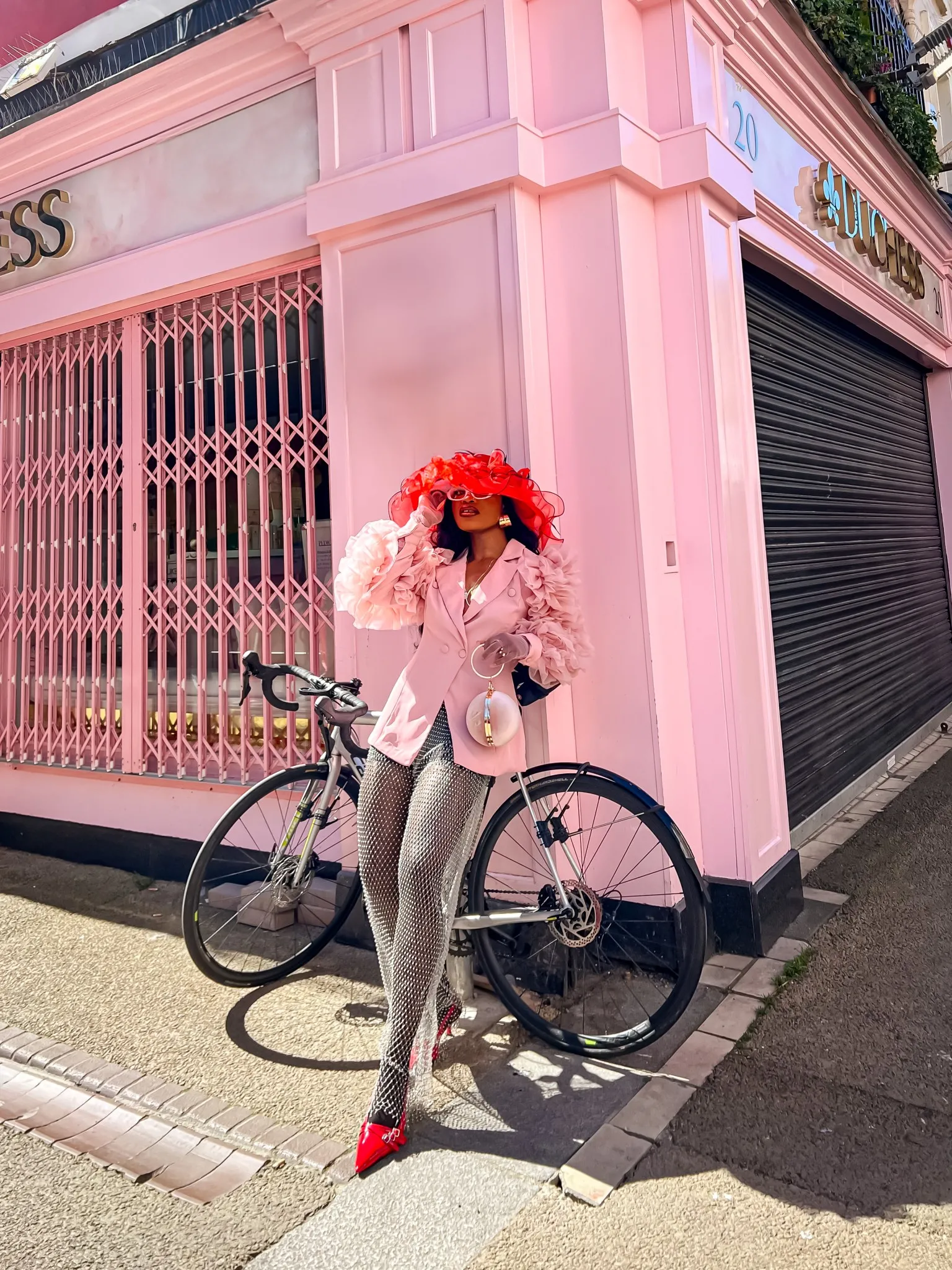 Eagle Productions Portraits Woman Pink Building Bicycle