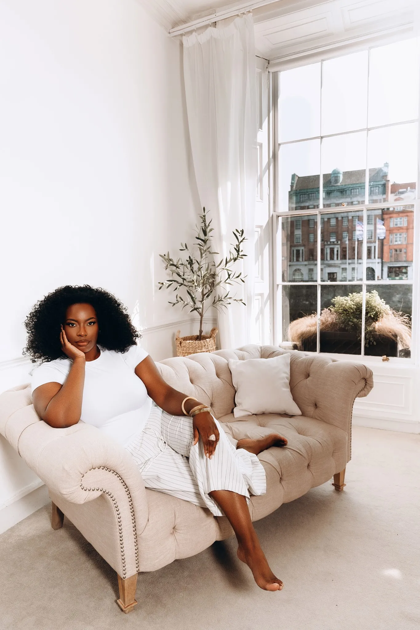 Eagle Productions Portraits Woman White Sofa Natural Light