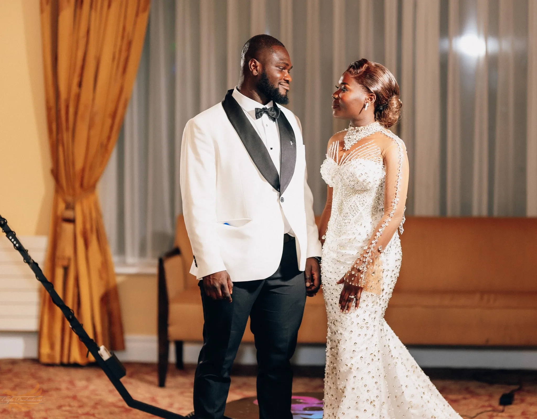 Eagle Productions Weddings Engagements Couple White Suit Bride Indoor