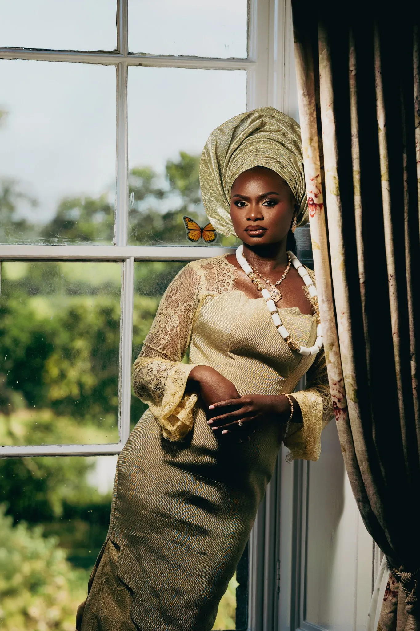 Eagle Productions Weddings Engagements Woman Gold Headwrap Window