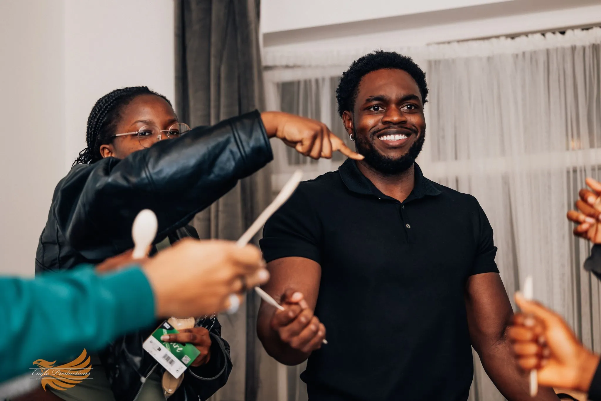 Group gathering enjoying a fun activity with friends at Eagle event.