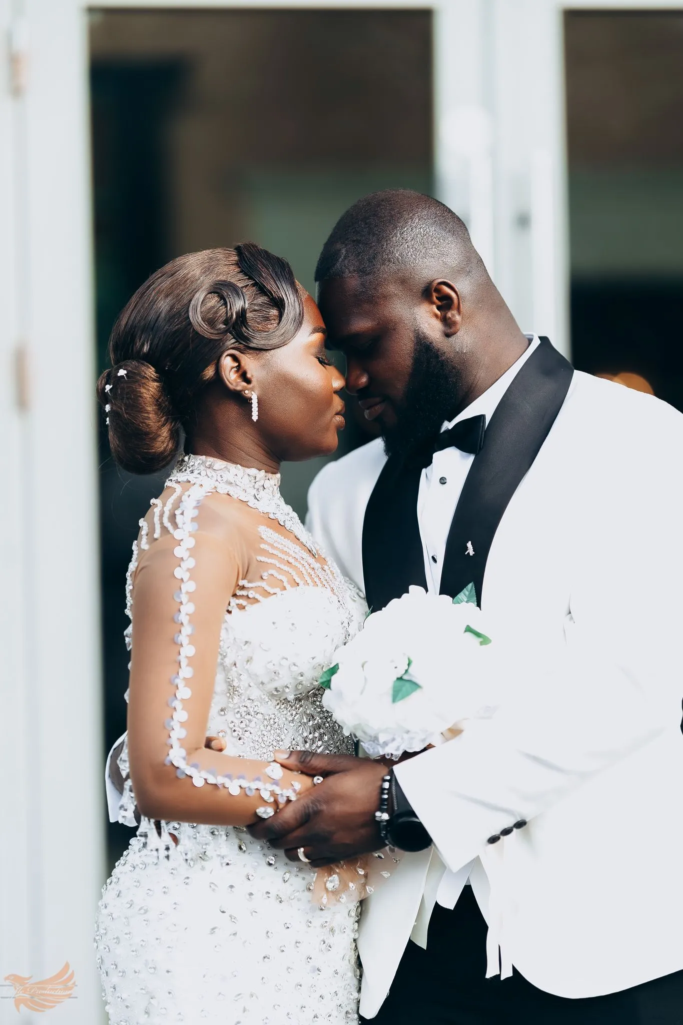 Wedding couple embrace in elegant attire, Eagle website